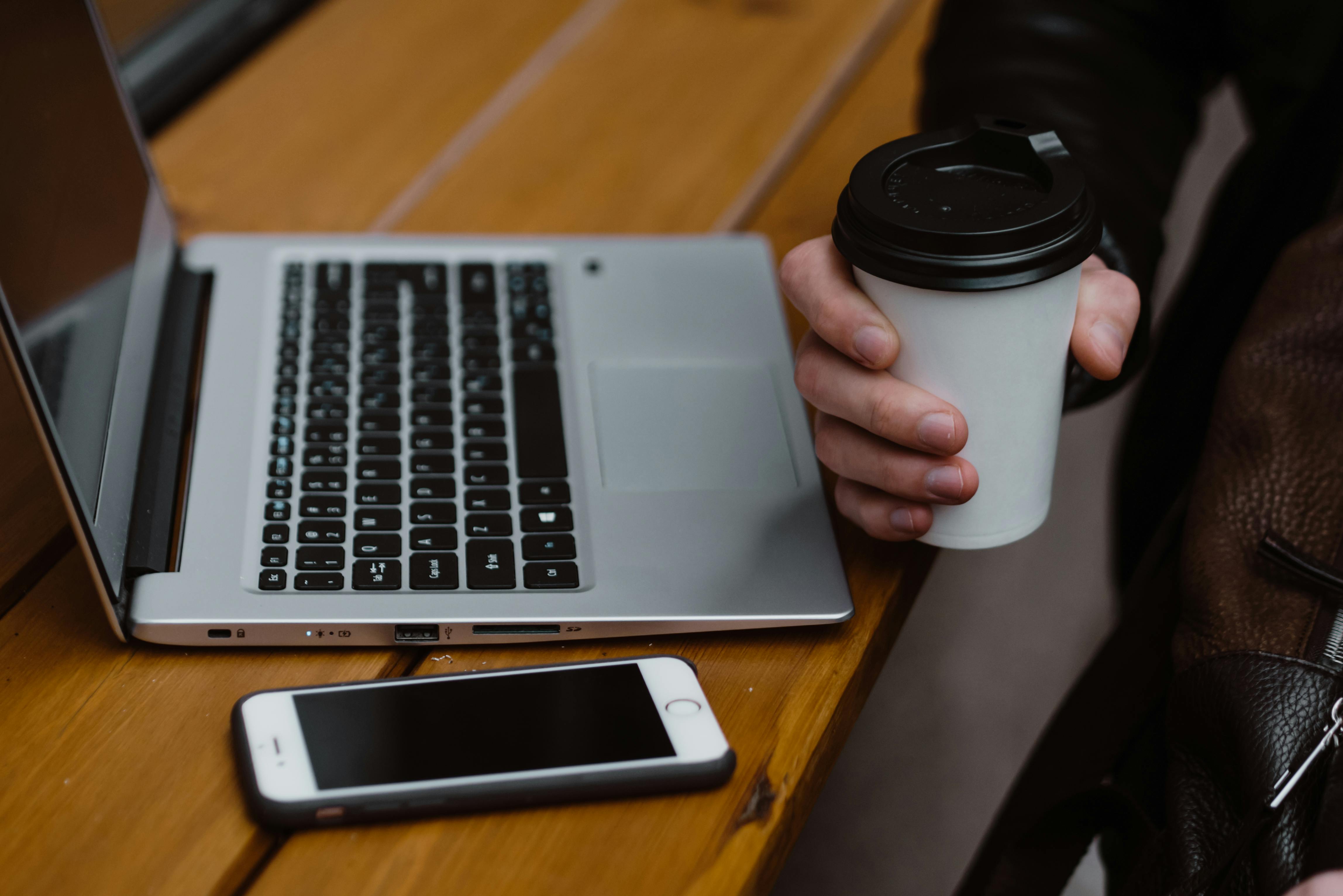 Laptop and phone on a desk